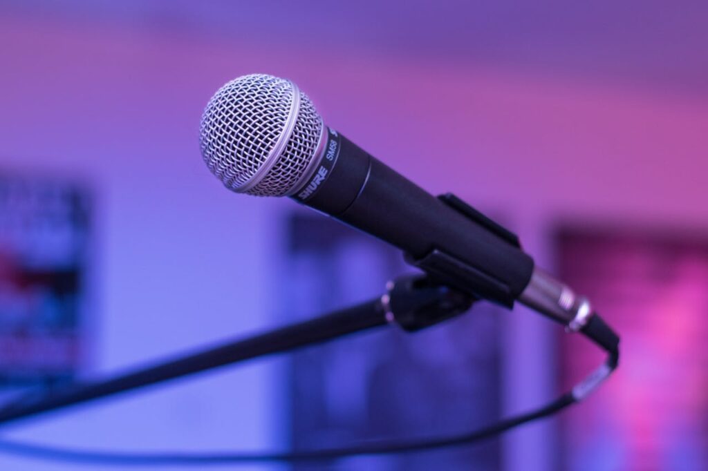 pexels-photo-164960 A focused capture of a microphone in a studio environment, ideal for audio-themed projects.